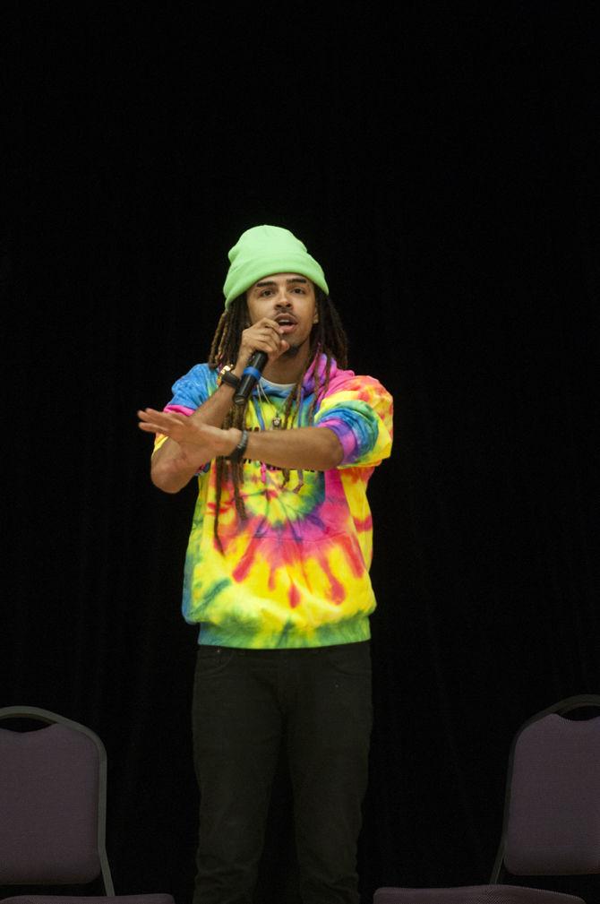 Rapper alumnus gives financial literacy talk in Royal Cotillion Ballroom