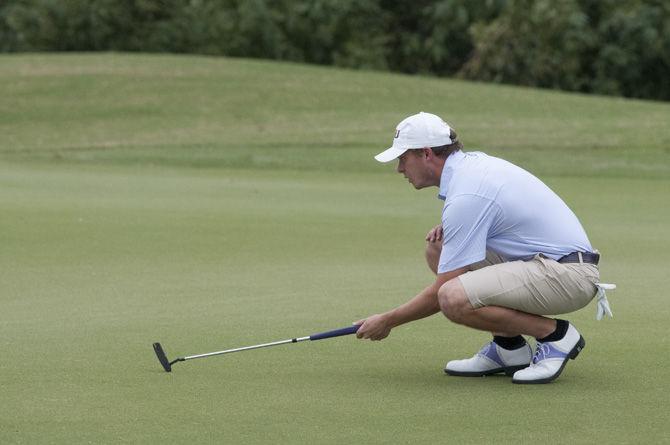 LSU junior golfer Brandon Pierce lines up his putt during the David Toms Intercollegiate tournament on Oct. 11, 2015, at the University Club golf course.