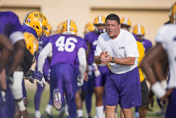 LSU interim head coach Ed Orgeron yells instructions to the players as they run through a drill during an outdoor practice on Tuesday Sept. 27, 2016, on the LSU footbal practice fields at the LSU Football Practice and Training Facilities.