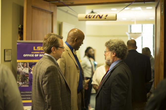 Faculty members chat during the Office of Diversity open house on Sept. 21, 2016 in Thomas Boyd Hall.