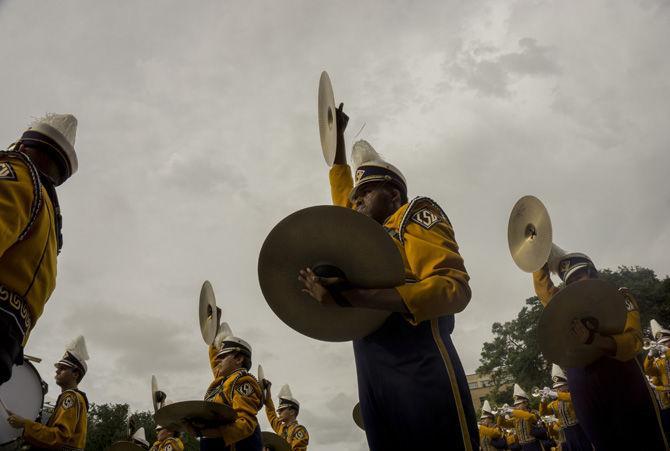 LSU percussionists hold their form before kickoff on Sept. 17, 2016 on North Stadium Road.