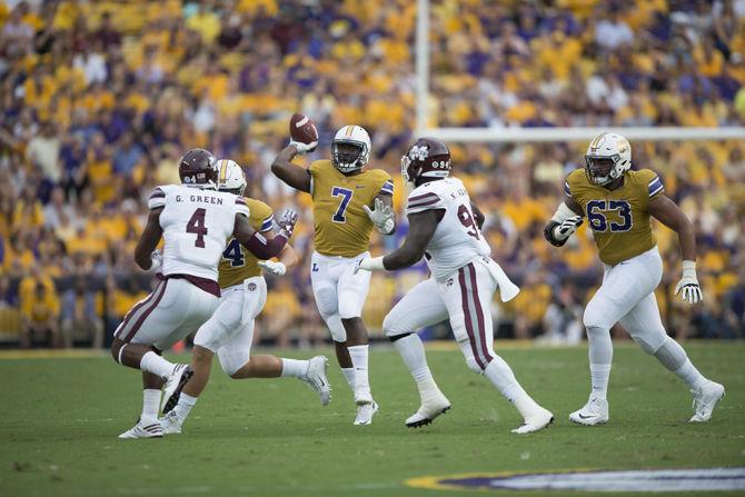 LSU junior running back Leonard Fournette (7) throws a forward lateral down field during the LSU vs Mississippi State game on Saturday Sept. 17, 2016, at Tiger Stadium.