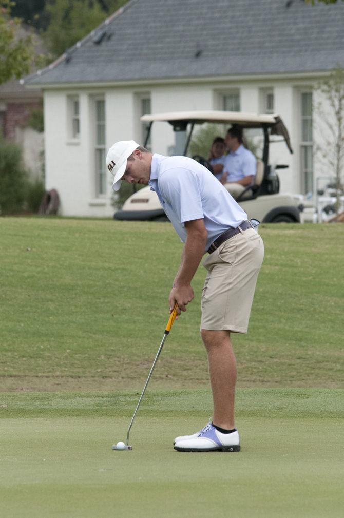 LSU freshman golfer Sam Burns prepares to putt the ball during the David Toms Intercollegiate tournament on Oct. 11, 2015, at the University Club golf course.