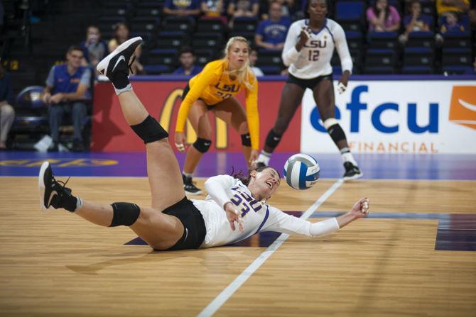 LSU junior setter/defensive specialist Cheyenne Wood (23) misses the ball during the Tigers' 3-1 loss against Southern Miss on Saturday, Sept. 3, 2016 in the Pete Maravich Assembly Center.