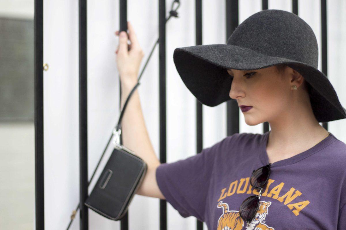 Maria Vidrine style her look with shades and a sun hat to keep cool in the sun on Friday, Sept. 9, 2016 outside of Tiger Stadium on LSU campus.