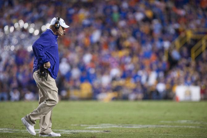 LSU head coach Les Miles walks towards the sidelines on Saturday, Oct. 17, 2015, during the Tigers' 35-28 victory against Florida in Tiger Stadium.