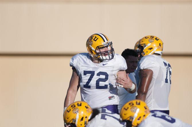 LSU junior center Andy Dodd (72) speaking to his coaches on Tuesday Oct. 11, 2016 during the tigers' practice at the LSU Practice Facilities.