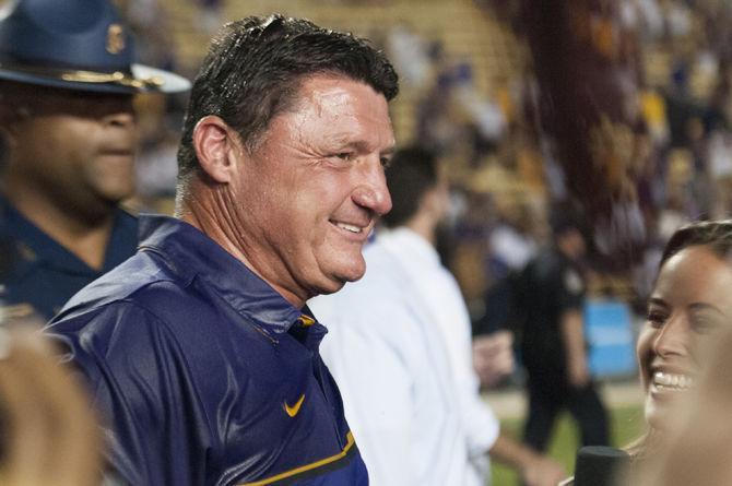 LSU Interim Head Coach Ed Orgeron celebrates after the Tigers' 42-7 victory against Missouri on Saturday, Oct. 1, 2016 in Tiger Stadium.&#160;