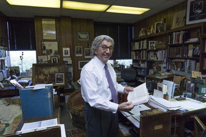 LSU Law professor Paul Baier reads up on some legal literature in his LSU Law Center office on Oct. 3, 2016.