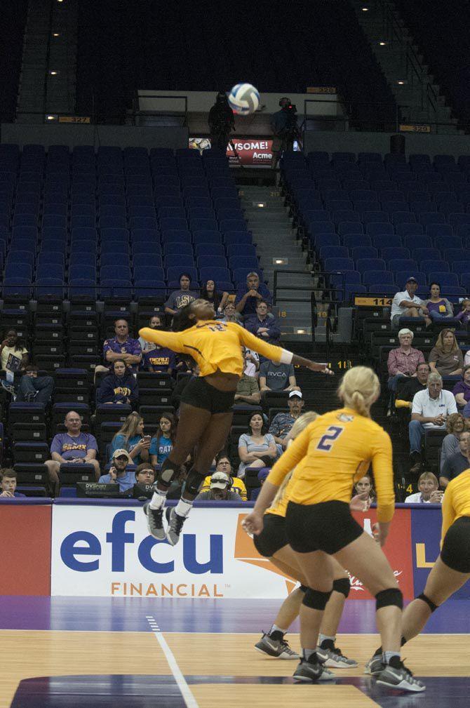 LSU junior outside hitter/right side Gina Tillis (12) returning the ball during Tiger's (3-0) loss against University of Florida on Oct. 14, 2016 at the Pete Maravich Assembly Center.