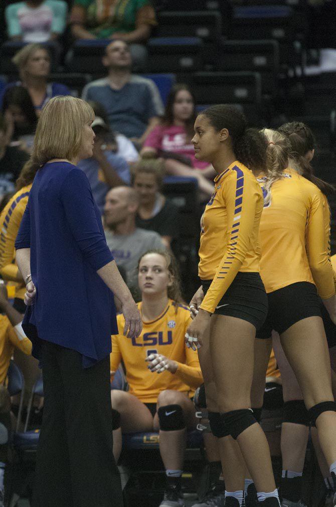 LSU headcoach Fran Flory talking with freshman outside hitter Milan Stokes (17) during Tiger's (3-0) loss against University of Florida on Oct. 14, 2016 at the Pete Maravich Assembly Center.