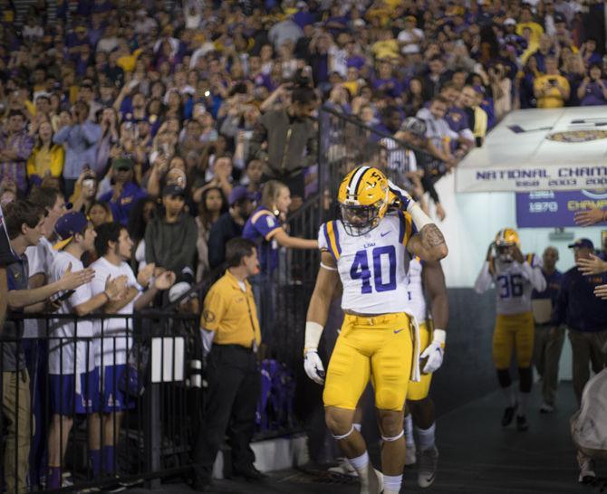 LSU senior linebacker Duke Riley (40) steps on to the field on Saturday Oct. 22, 2016 before the Tigers' 38-21 victory over Ole Miss at Tiger Stadium.