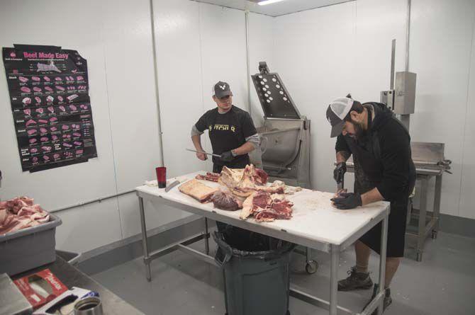 Iverstine Farms Butcher shop workers prepping meat on Oct. 25, 2016, located at 4765 Perkins Rd.