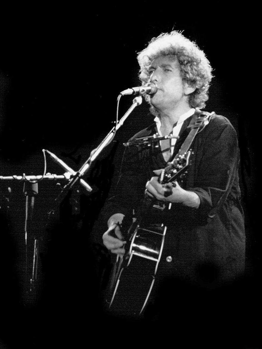 Dylan performs with his guitar in Barcelona, Spain.