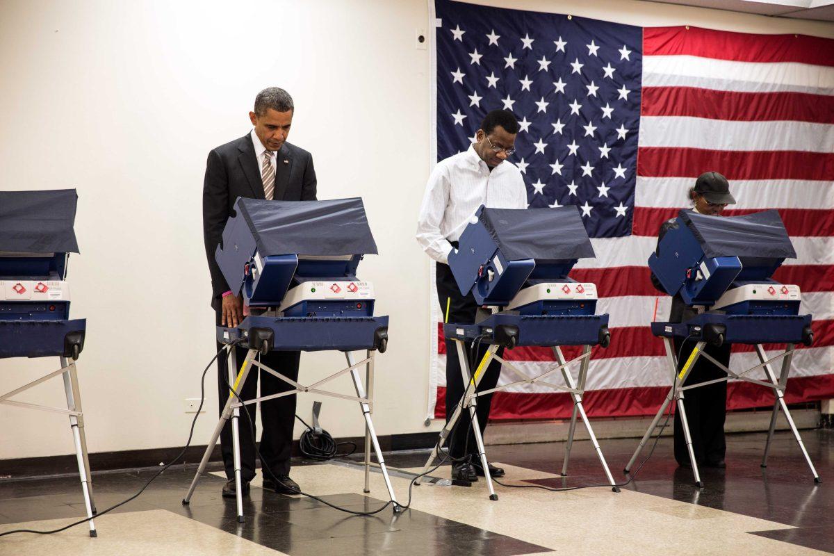 President Barack Obama casts his ballot during early voting at the Martin Luther King Jr. Community Center in Chicago, Ill., Oct. 25, 2012. (Official White House Photo by Pete Souza)