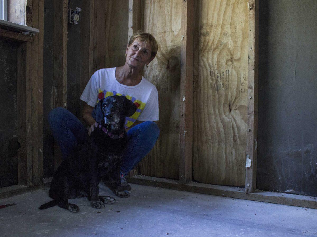 Baton Rouge resident and artist Rosemary Goodell sits in her at-home studio space with her dog,&#160;Jill, who would often keep her company while she worked.&#160;