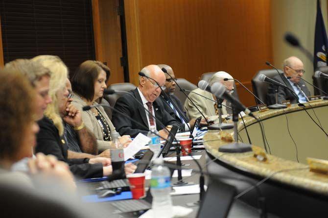 F. Travis Lavigne Jr., alongside the rest of the committee, discuss the TOPS scholarship requirement changes and budget issues at the Louisiana Student Financial Assistance Commission meeting Thursday, Aug. 20, 2015, in Baton Rouge.