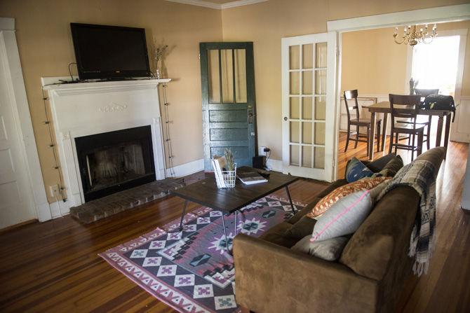 Portrait photographer Darian Tarver's living room filled with warm colored and contrasting decor on Tuesday Oct. 4, 2016, on Morning Glory Avenue.