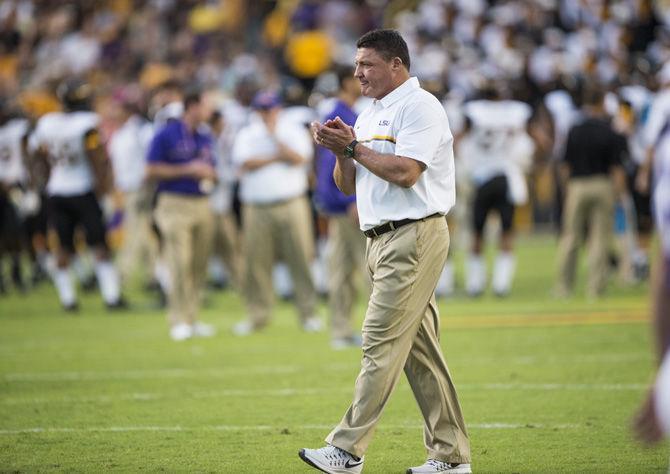 LSU interim head coach Ed Orgeron leads warm up drills before the LSU 45-10 win against Southern Mississippi on Saturday Oct. 15, 2016, in Tiger Stadium.