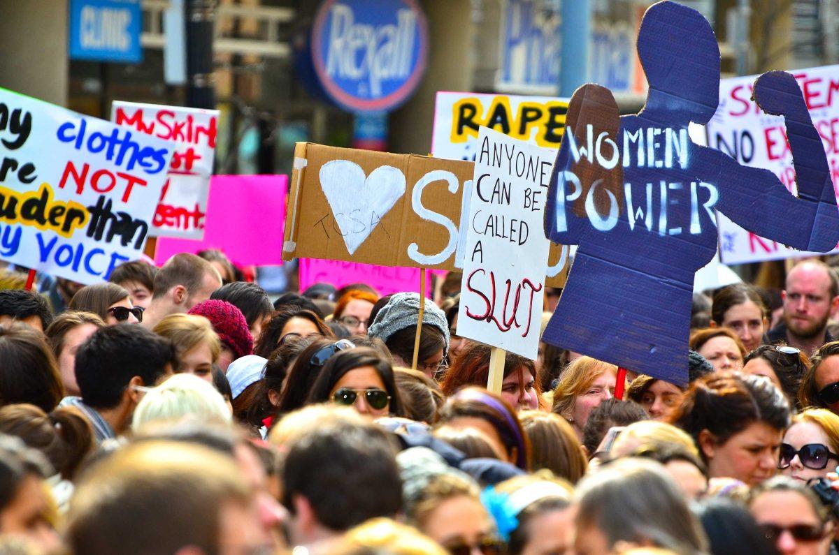 People participate in the first Slut Walk protest in Toronto, Canada on April 3, 2011