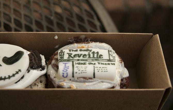 A customized Daily Reveille cupcake depicts Chelsi's cupcake collection.