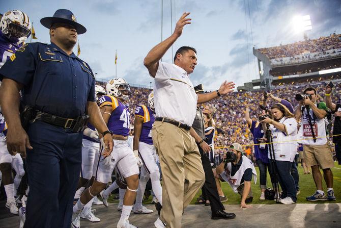 LSU interim head coach Ed Orgeron leads the Tigers out of the locker room before the LSU 45-10 win against Southern Mississippi on Saturday Oct. 15, 2016, in Tiger Stadium.