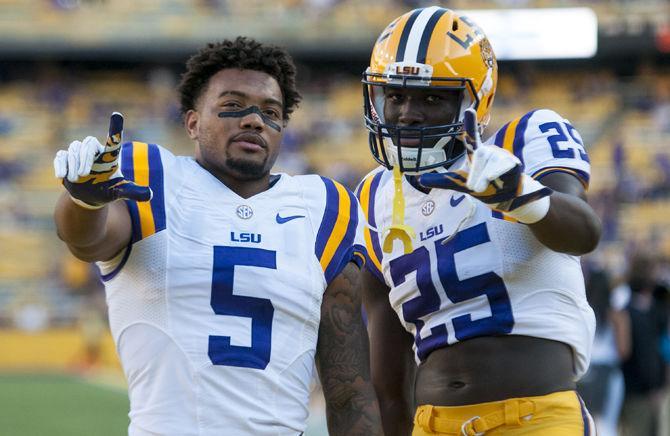 LSU sophomore running back Derris Guice (5) and freshman wide receiver Drake Davis (25) pose for a photo before the Tigers' 42-7 victory against Missouri on Saturday, Oct. 1, 2016 in Tiger Stadium.&#160;