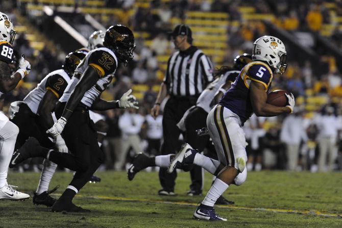 LSU sophomore running back Derrius Guice (5) advances the ball on Saturday, Oct. 15, 2016, during the Tigers' 45-10 victory against Southern Miss in Tiger Stadium.