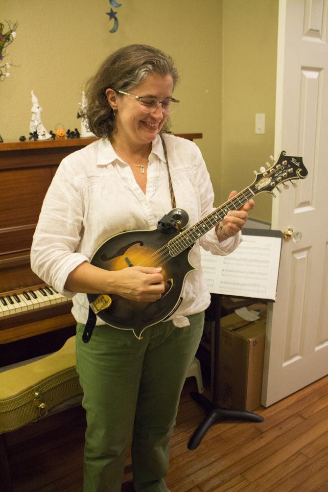 Heather Feierabend, mandolin player for the band The Wilder Janes, talks about their newly released album on Tuesday, Oct. 11, 2016 in then bands practice room.