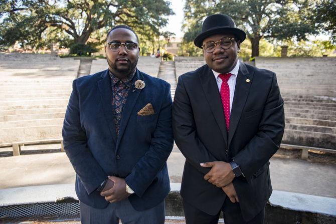 LSU business management senior Chase Warner (left) and African and African American studies and political science senior Monturios Howard (right) organize the 100 black suit and dress challenge Monday Oct. 17, 2016, in the LSU Greek Theater.