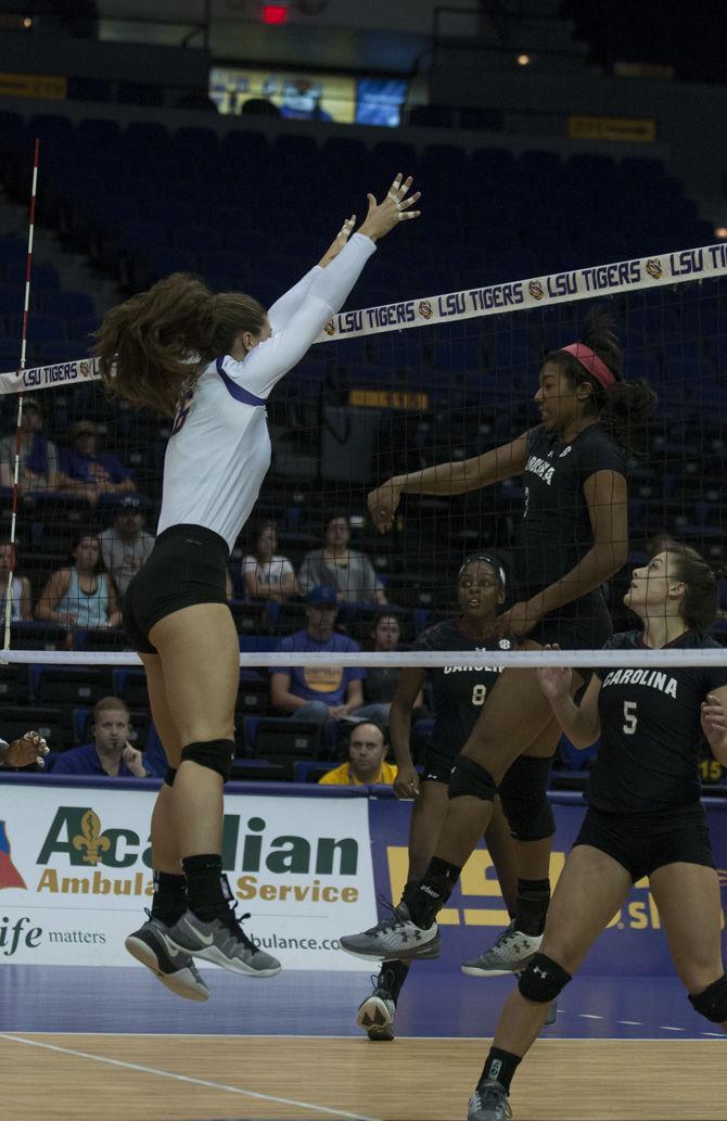 LSU sophomore middle blocker Tiara Gibson (6) jumps to block the ball during the Tigers' 3-1 loss against the University of South Carolina on October 16, 2016 at the Pete Maravich Assembly Center.