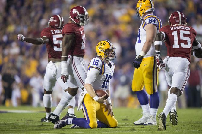 LSU junior quarterback Danny Etling (16) gets up after being sacked during the Tigers 10-0 loss against Alabama on Saturday Nov. 5, 2016, in Tiger Stadium.