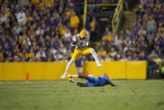 LSU freshman corner back Kevin Toliver II (2) runs down Florida sophomore wide receiver&#160;Brandon Powell (4) during the LSU 35-28 victory against the Gators on Saturday Oct. 17, 2015, in Tiger Stadium on LSU's campus.