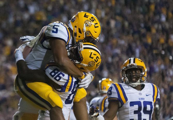 LSU sophomore running back Derris Guice (5) celebrates a touchdown with sophomore wide receiver Jazz Ferguson (86) during the Tigers' 42-7 victory against Missouri on Saturday, Oct. 1, 2016 in Tiger Stadium.&#160;