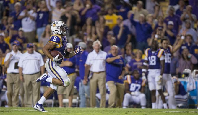 LSU sophomore running back Derrius Guice (5) runs toward the Eagles end-zone uncontested during the LSU 45-10 win against Southern Mississippi on Saturday Oct. 15, 2016, in Tiger Stadium.