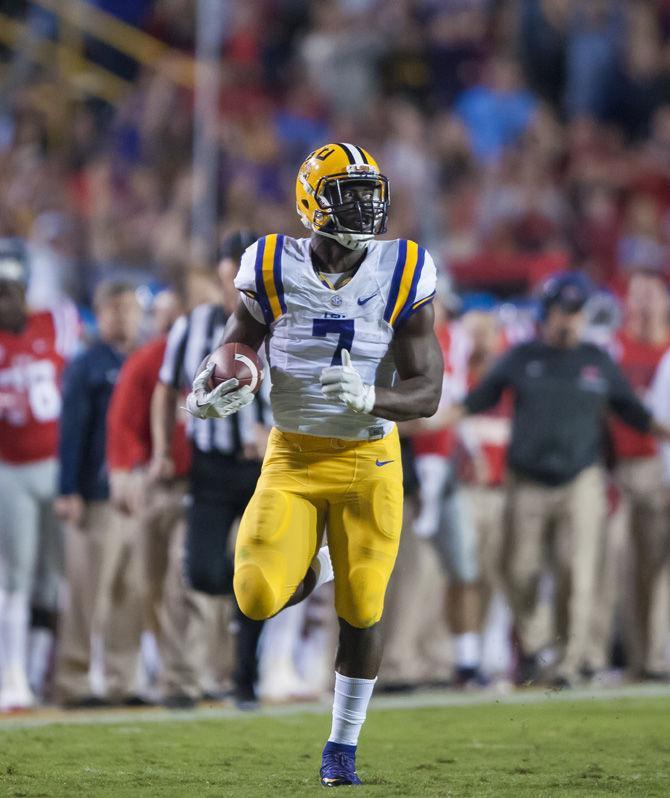 Junior running back Leonard Fournette (#7) runs the ball for a touchdown on Saturday, Oct. 22, during the second quarter of the Tigers contest against Ole Miss.