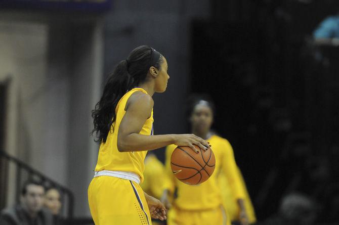 LSU sophomore guard Chloe Jackson (0) dribbles the ball during the Tigers' 76-53 loss to the UConn Huskies on Sunday, Nov. 20, 2016 in the Pete Maravich Assembly Center.