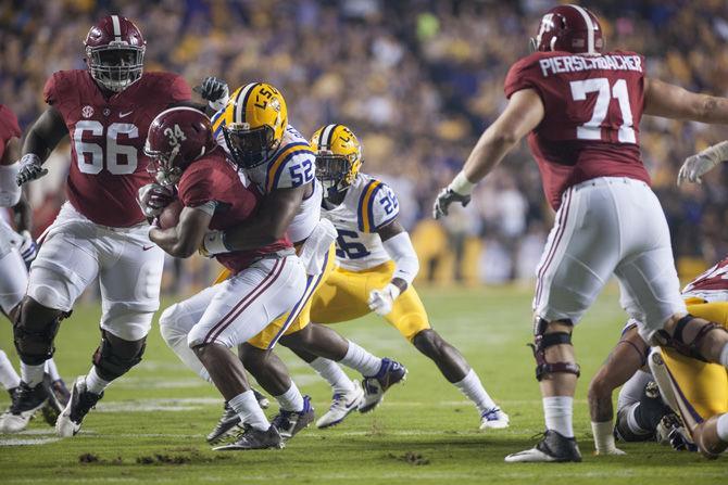 LSU senior linebacker, Kendell Beckwith (52), tackles Alabama senior running back, Damien Harris (34), in the 0-10 LSU loss against Alabama on Saturday, Nov. 5, 2016, in Tiger Stadium.