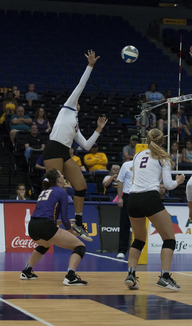 LSU freshman outside hitter Sydney Mukes (19) spikes the ball during the Tigers' 3-1 loss against the University of South Carolina on October 16, 2016 at the Pete Maravich Assembly Center.