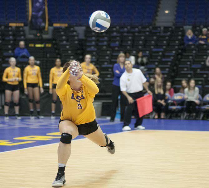 LSU sophomore defensive specialist Katie Kampen (9) dives for the ball during the Lady Tigers' 3-2 victory over the University of Georgia on Friday Nov. 11, 2016 at the Pete Maravich Assembly Center.