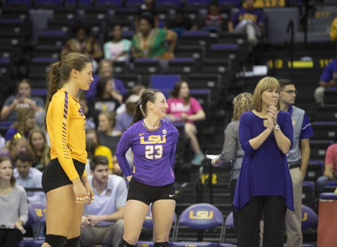 LSU senior middle blocker Tiara Gibson (6), junior setter and defensive specialist Cheyenne Wood (23), and head coach Fran Flory await the start of play on Friday Oct. 14, 2016 during the Lady Tigers' 3-0 loss to the Florida Gators in the Pete Maravich Assembly Center.