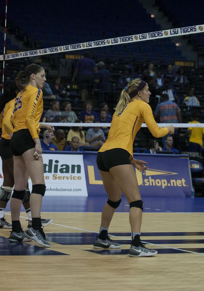 LSU sophomore middleblocker Olivia Beyer (8) and sophomore outside hitter/ right side Toni Rodriguez (25) reset before the serve during the Tigers' 3-1 loss against Ole Miss on November 4, 2016 in the Pete Maravich Assembly Center.