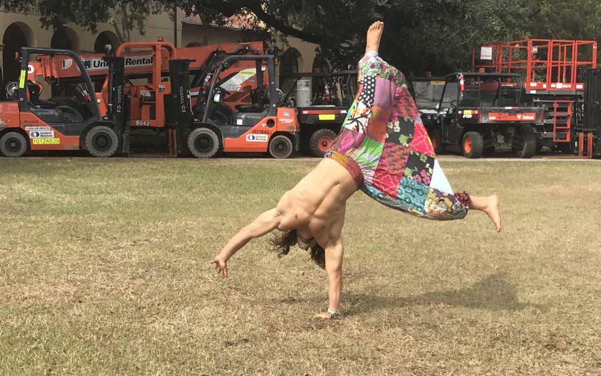 Communication studies sophomore Gage Howell practices gymnastics routines, parkour and capoeira in the Quad.