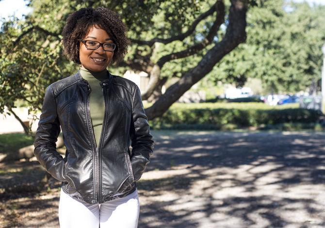 University graduate&#160;student Carly Penn dresses in accordance with the dropping temperatures with a stylish winter ensemble on Monday Nov. 21, 2016, on campus.