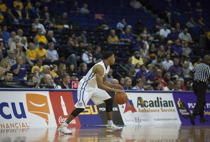 LSU junior guard Jalyn Patterson (11) dribbles the ball during the Tigers' 84-65 win against the University of Houston on Tuesday, Nov. 29, 2016 in the Pete Maravich Assembly Center.