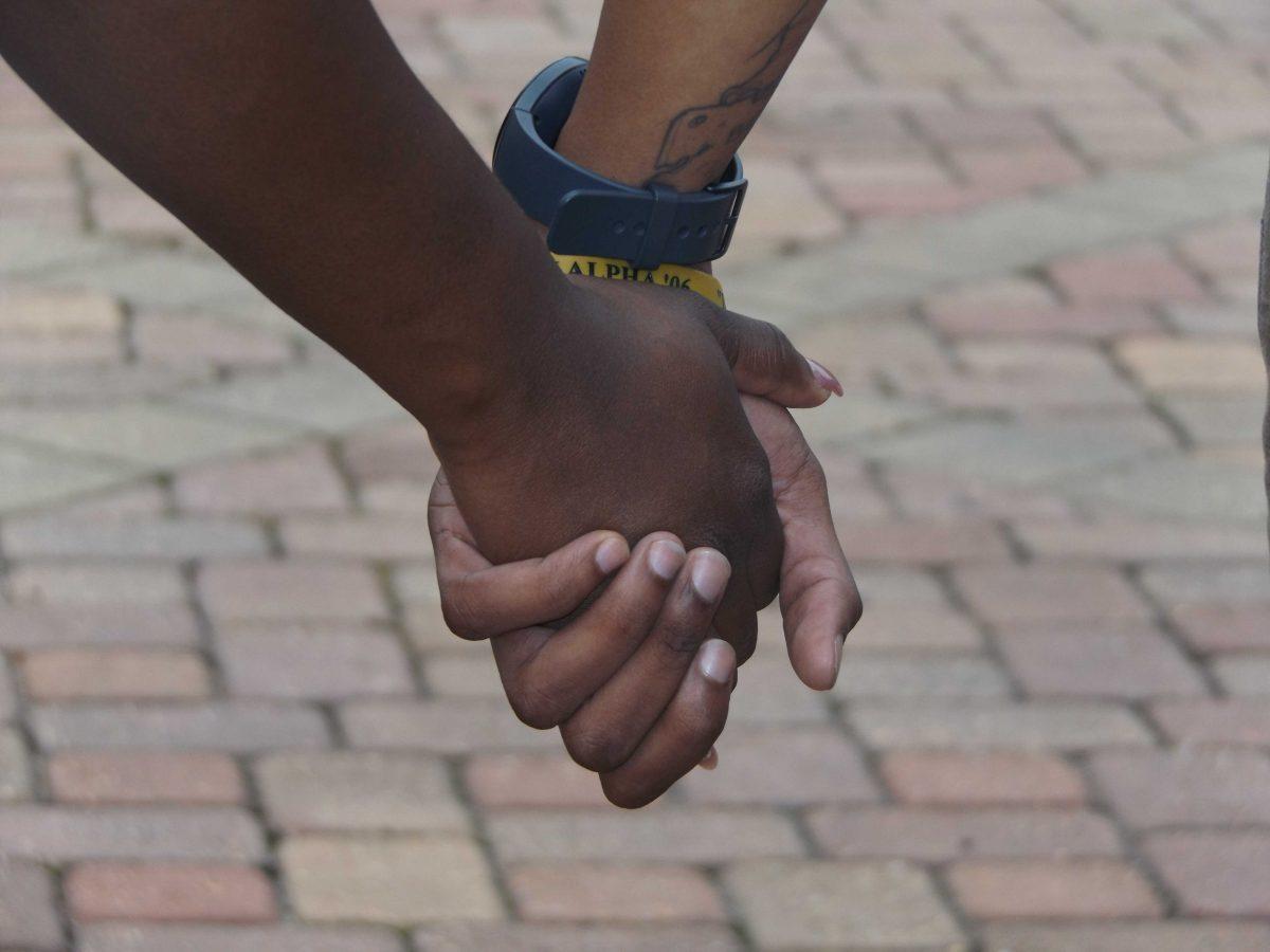 Students and community members gathered at the Memorial Tower Monday, July 11, for a Unity Prayer following the weekend's Alton Sterling protests.