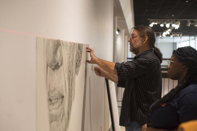 'Passages of Time' exhibit features charcoal drawings, depicts people's lives in moments of time