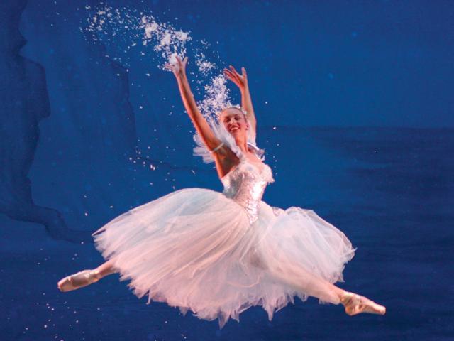 A Baton Rouge Ballet Theatre ballerina leaps during the snow scene during a rehearsal of its 2011 production of "The Nutcracker."