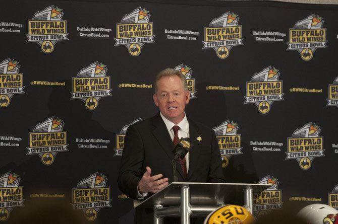 Louisville head coach Bobby Petrino addresses the media on Friday, Dec. 30, 2016, during a Buffalo Wild Wings Citrus Bowl press conference at the Hilton Hotel in Orlando.