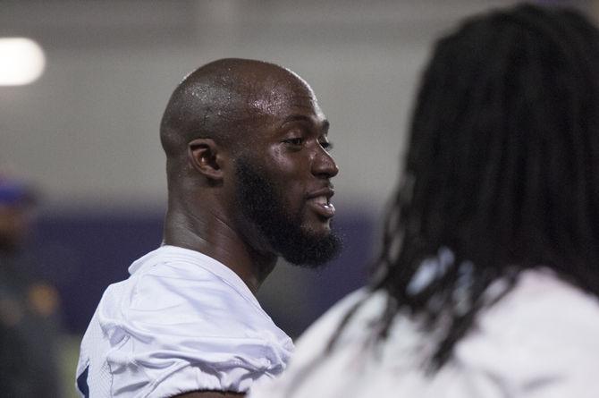 LSU junior Leonard Fournette (7) talks to his teammates during the Tigers' spring practice session on Tuesday, Mar. 8, 2016 in the Football Operations Center.